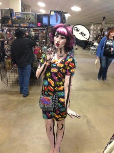 This was my favorite costumed character. She portrayed "early comic graphics" and won Second Place in the costume contest. That "Oh, me" thought balloon is attached to the side of her head.